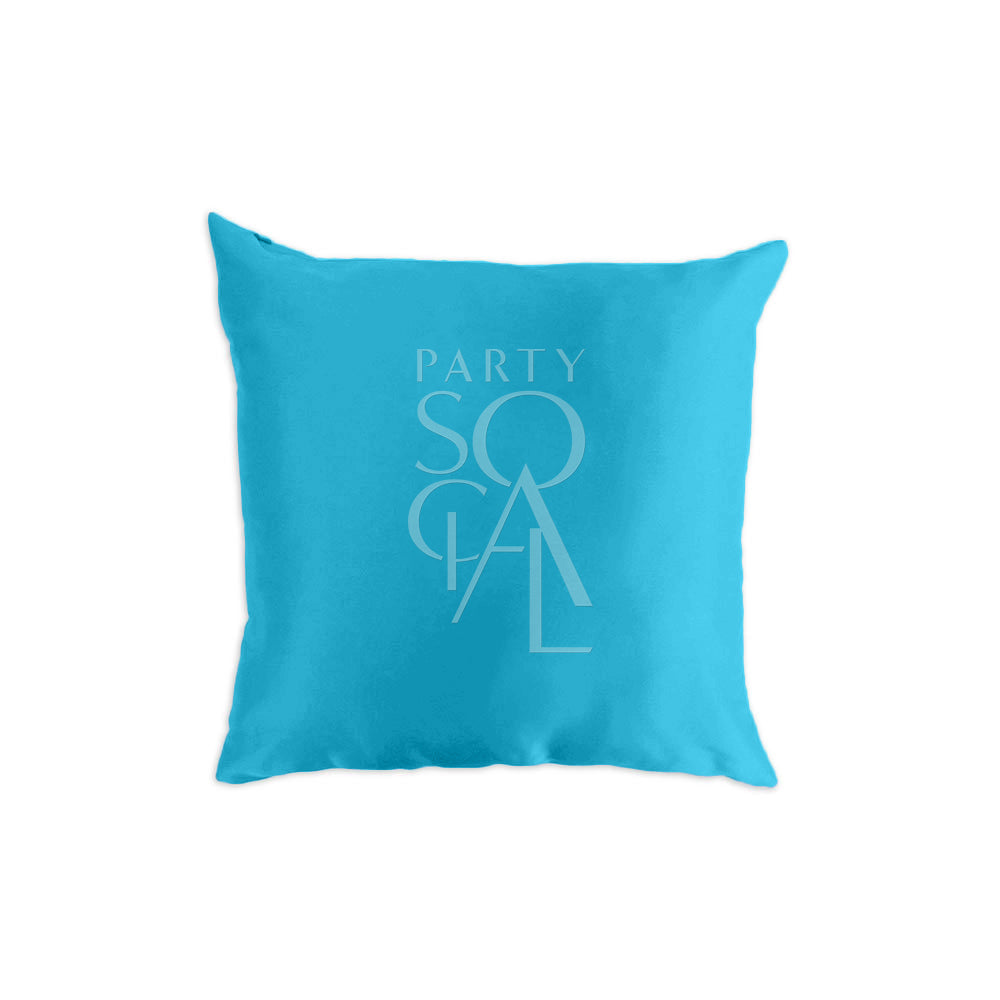 Bright satin cushion cover in turquoise, featuring a glossy and smooth surface. The vibrant turquoise color adds a lively and refreshing touch, perfect for adding a pop of color and elegance to any decor.