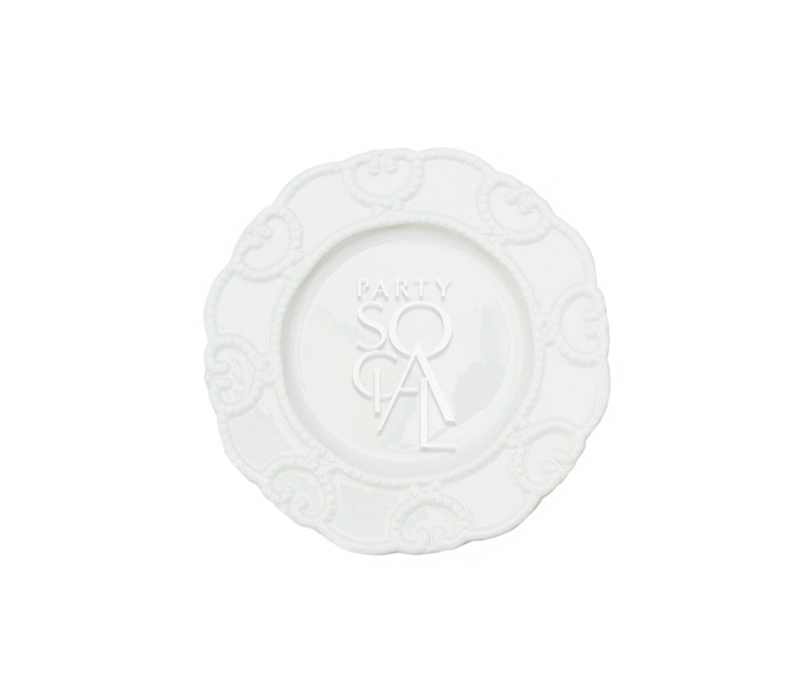 White embossed plates featuring a detailed, textured pattern that adds a touch of elegance to any table setting. The classic white color and intricate embossing make these plates suitable for both formal occasions and everyday dining, offering a sophisticated look with a subtle design element.