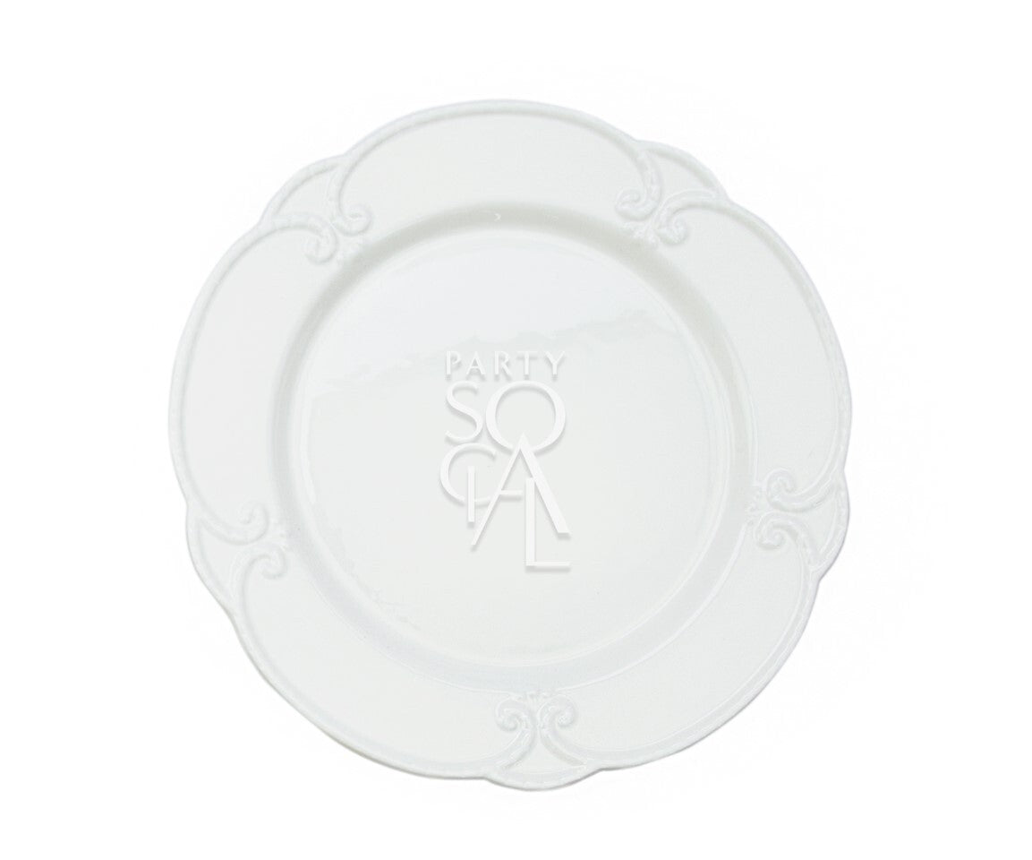 White embossed plates featuring a detailed, textured pattern that adds a touch of elegance to any table setting. The classic white color and intricate embossing make these plates suitable for both formal occasions and everyday dining, offering a sophisticated look with a subtle design element.