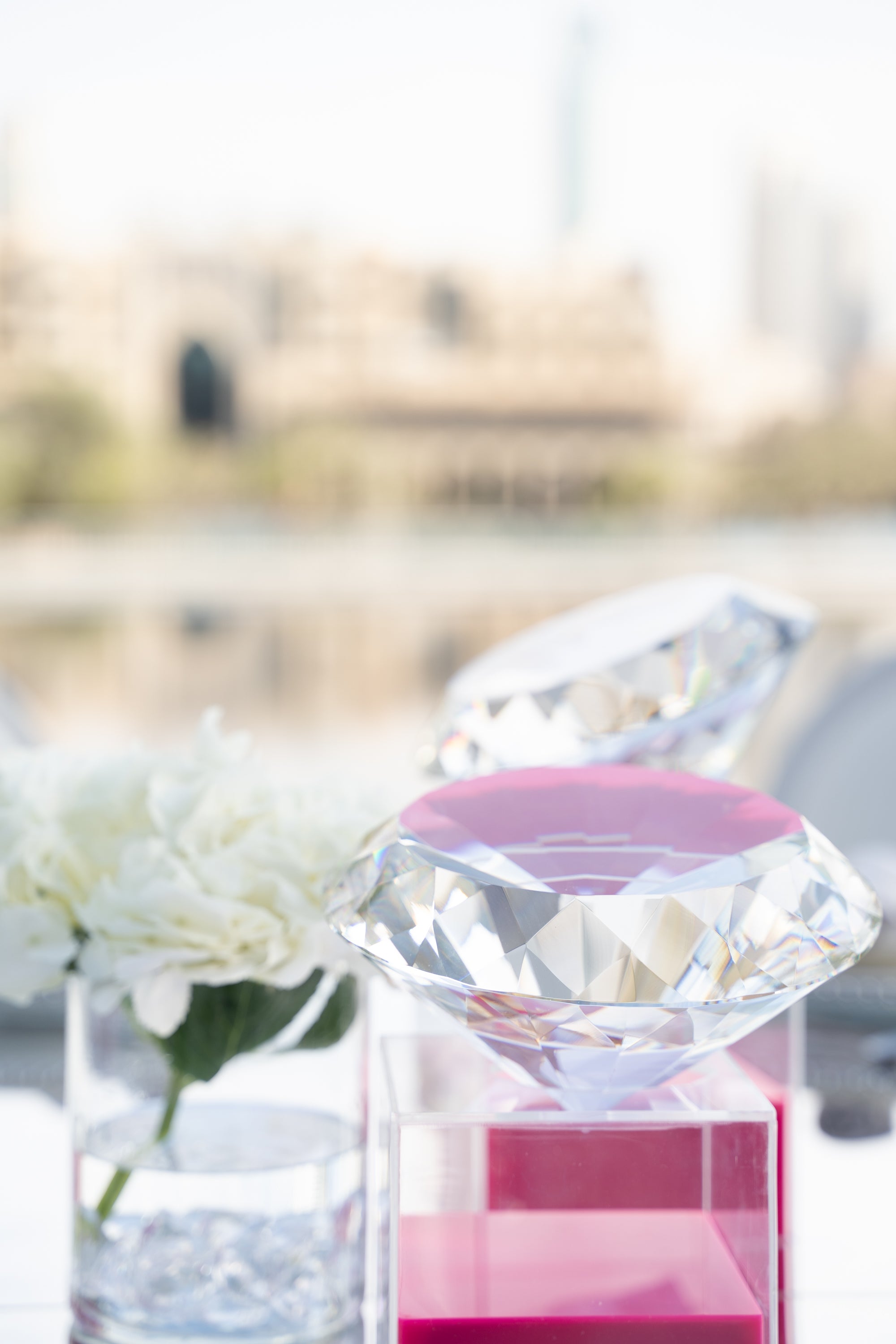 Luxurious diamond centerpiece designed to add a touch of glamour and elegance. The centerpiece features a dazzling diamond-shaped design with intricate detailing, reflecting light beautifully and creating a stunning focal point for any table or event.