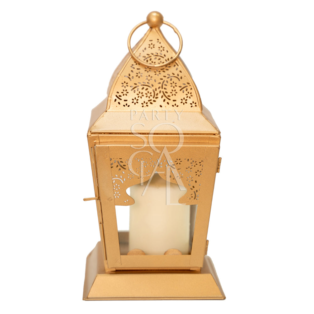 Chic rose gold lanterns with a modern metallic finish, featuring delicate cut-out patterns that cast beautiful light patterns. The lanterns add a touch of warmth and elegance, perfect for enhancing the ambiance of any space with a contemporary flair.