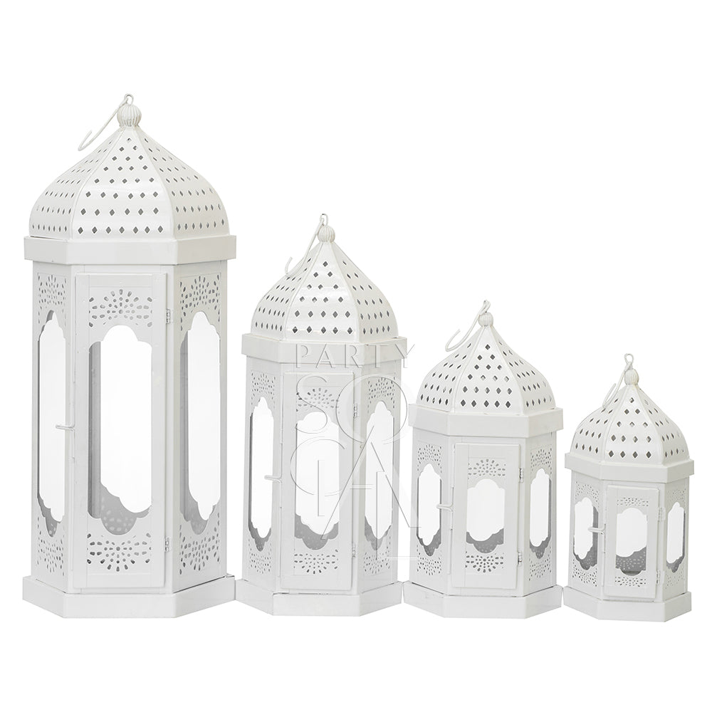 Elegant white Moroccan lanterns with intricate cut-out patterns, featuring a delicate design and soft white finish, adding a touch of exotic charm and sophistication to any space.