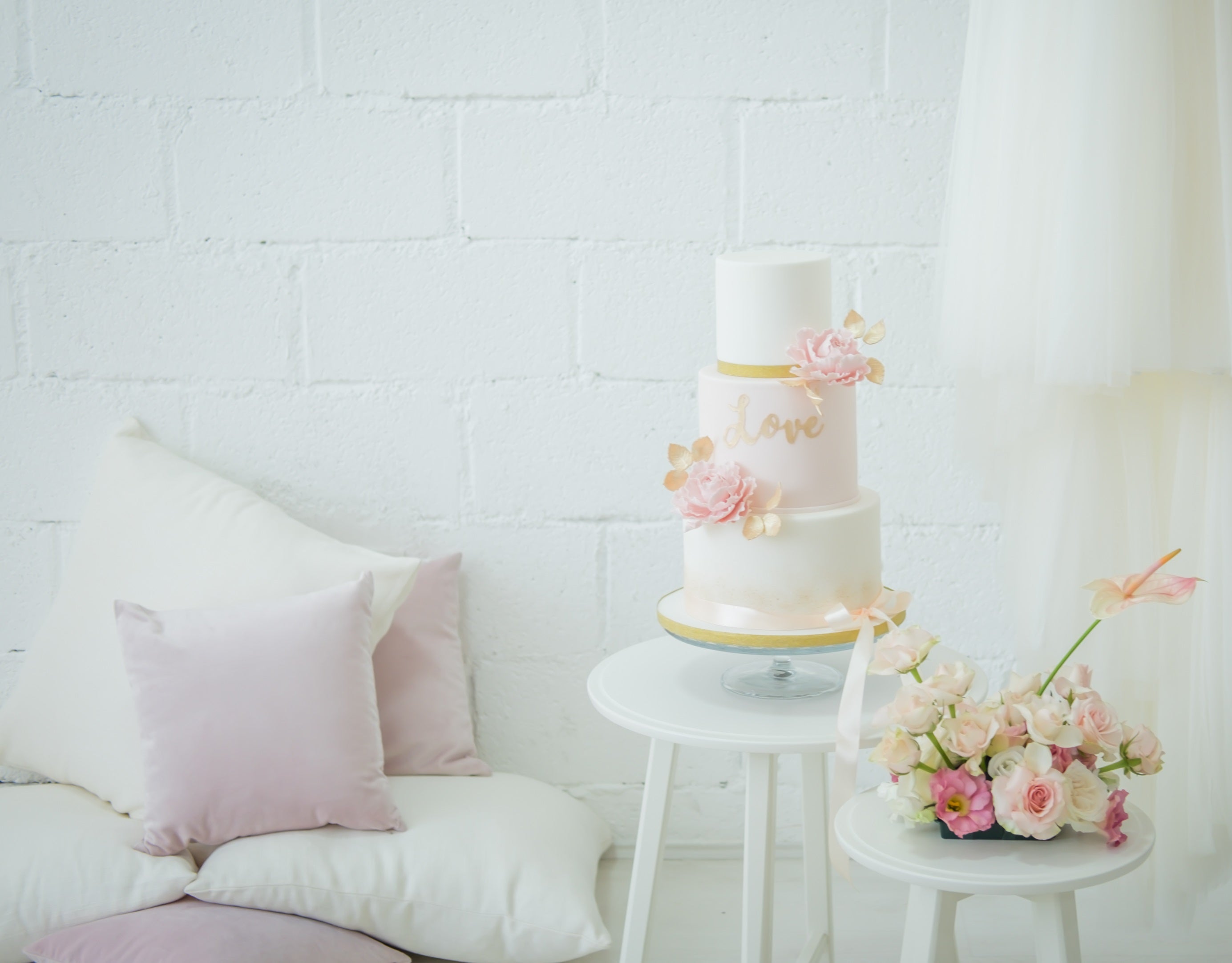 Velvet cushion cover in blush pink, adding a soft and elegant touch.