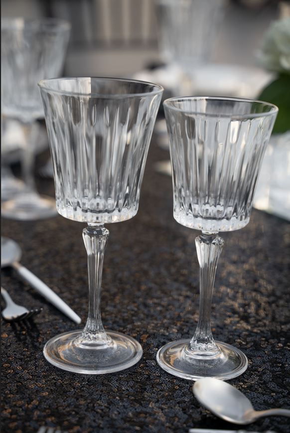 Luxurious crystal Paris glasses with a refined, elegant design and intricate detailing. The glasses feature a brilliant, clear crystal finish that enhances their sophisticated appearance, making them perfect for serving fine beverages and adding a touch of glamour to any table setting or special occasion.