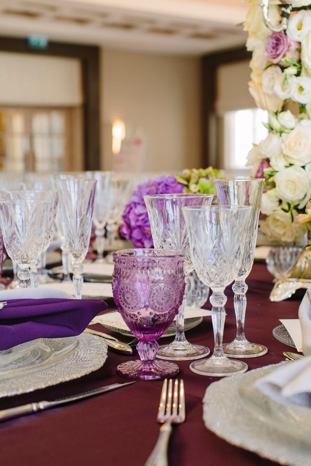 Exquisite crystal Rome glasses with intricate, faceted designs that catch and reflect light beautifully. These glasses feature a classic shape with a sturdy base, perfect for serving fine drinks or adding a touch of luxury to your table setting. The crystal-clear finish enhances the elegance and timeless appeal of these sophisticated glassware pieces.