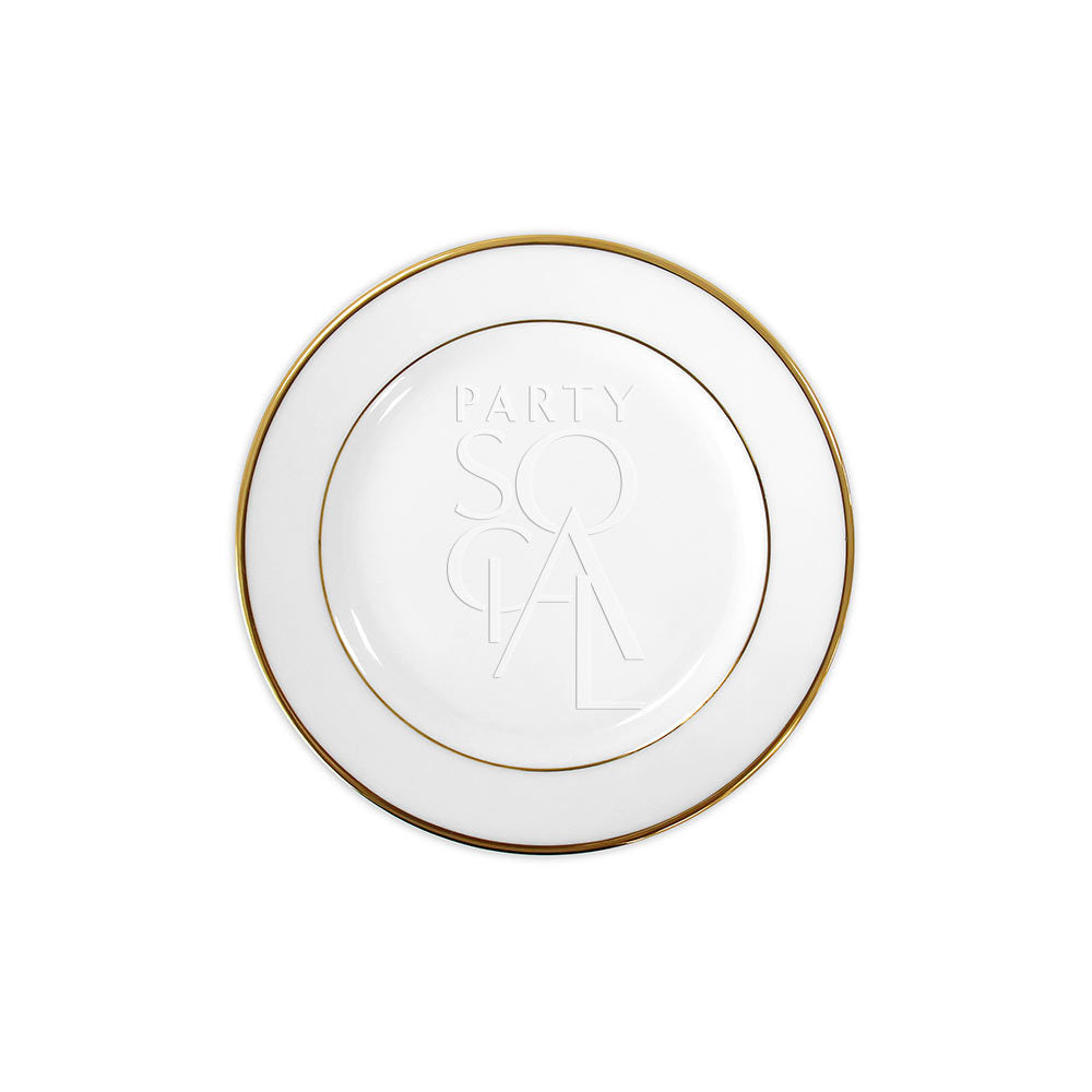Modern china plate with a refined gold rim, featuring a sleek and contemporary design that adds an elegant touch to any dining occasion.