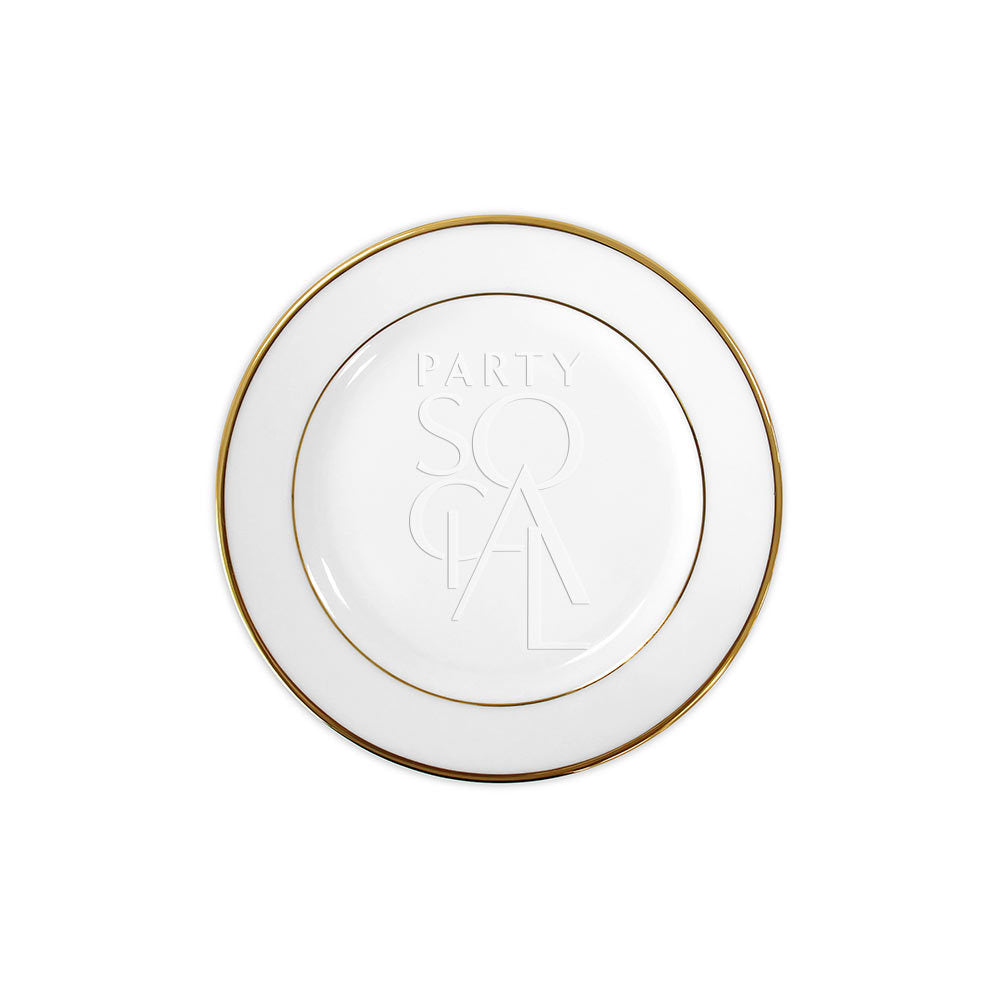 Modern china plate with a refined gold rim, featuring a sleek and contemporary design that adds an elegant touch to any dining occasion.