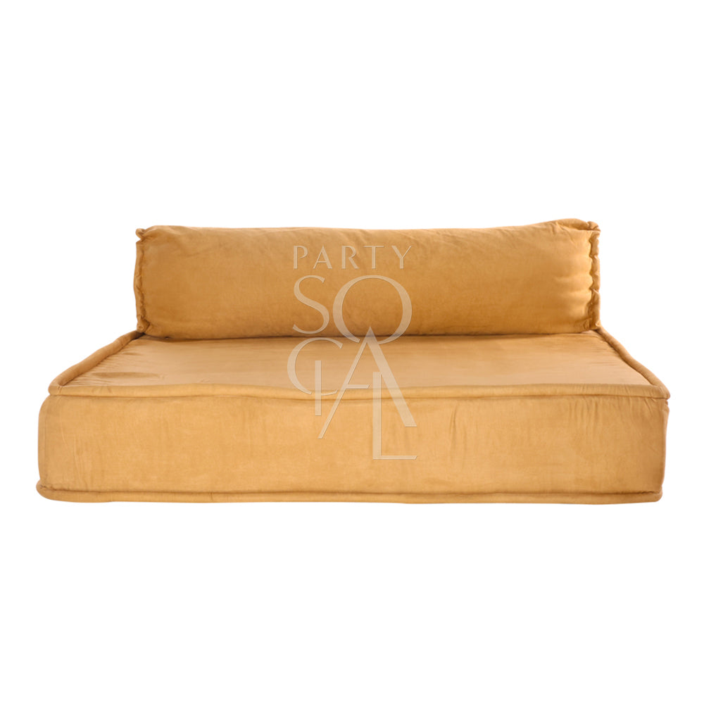 Spacious and modern lounge low seating arrangement featuring plush cushions and a sleek, low-profile design. The seating area includes a combination of modular pieces with soft upholstery in a neutral color palette, ideal for creating a comfortable and stylish relaxation space in contemporary living areas
