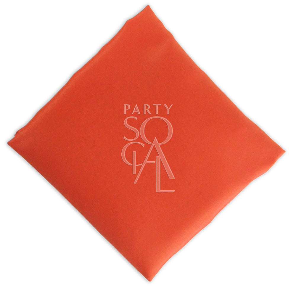 Vibrant orange satin napkin, featuring a bold and lively hue with a smooth, glossy finish. The orange satin adds a playful and energetic touch, perfect for a festive and cheerful table setting.