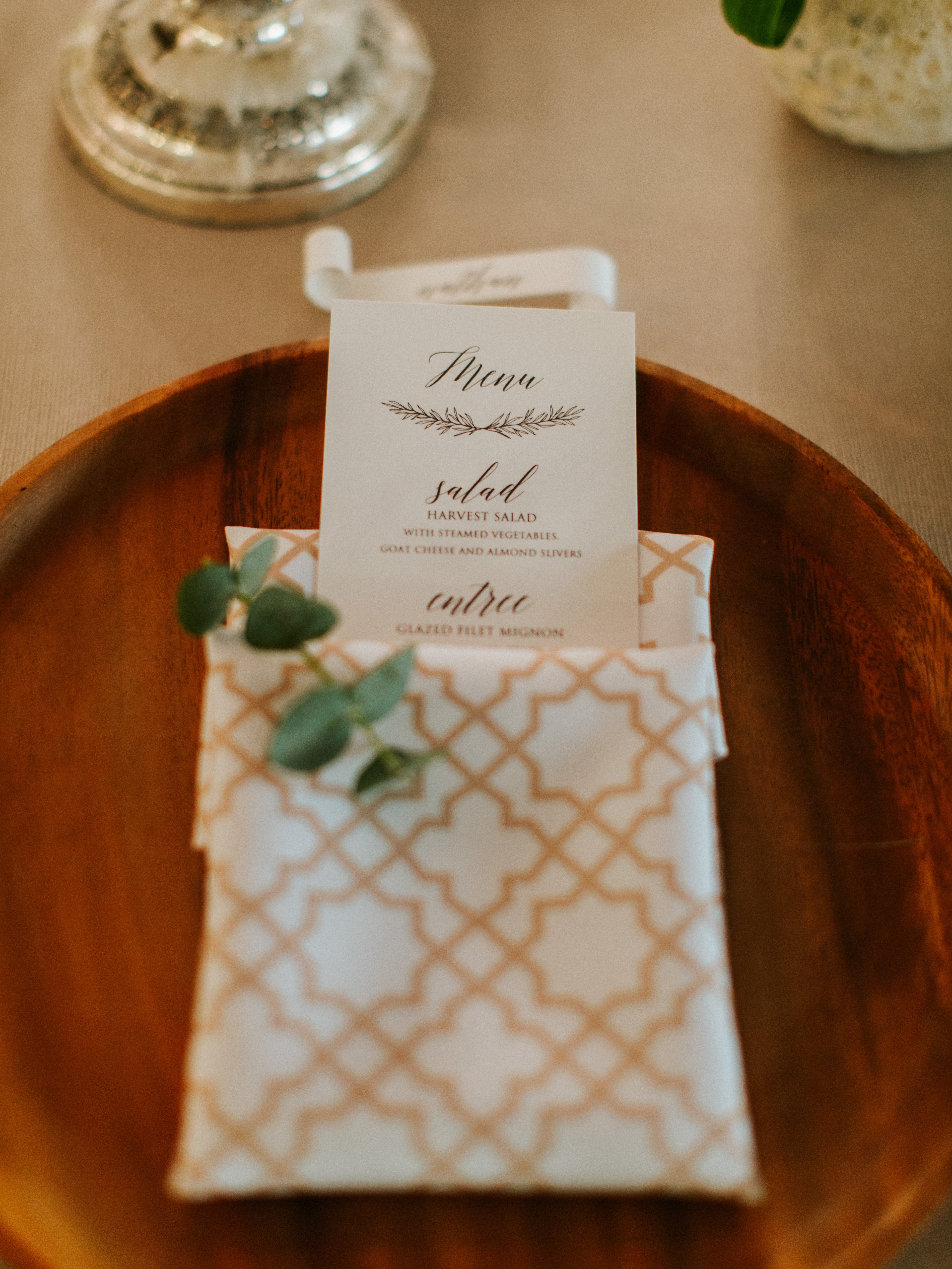 Gold arabesque polycotton napkin, featuring an intricate arabesque pattern in a rich gold tone.