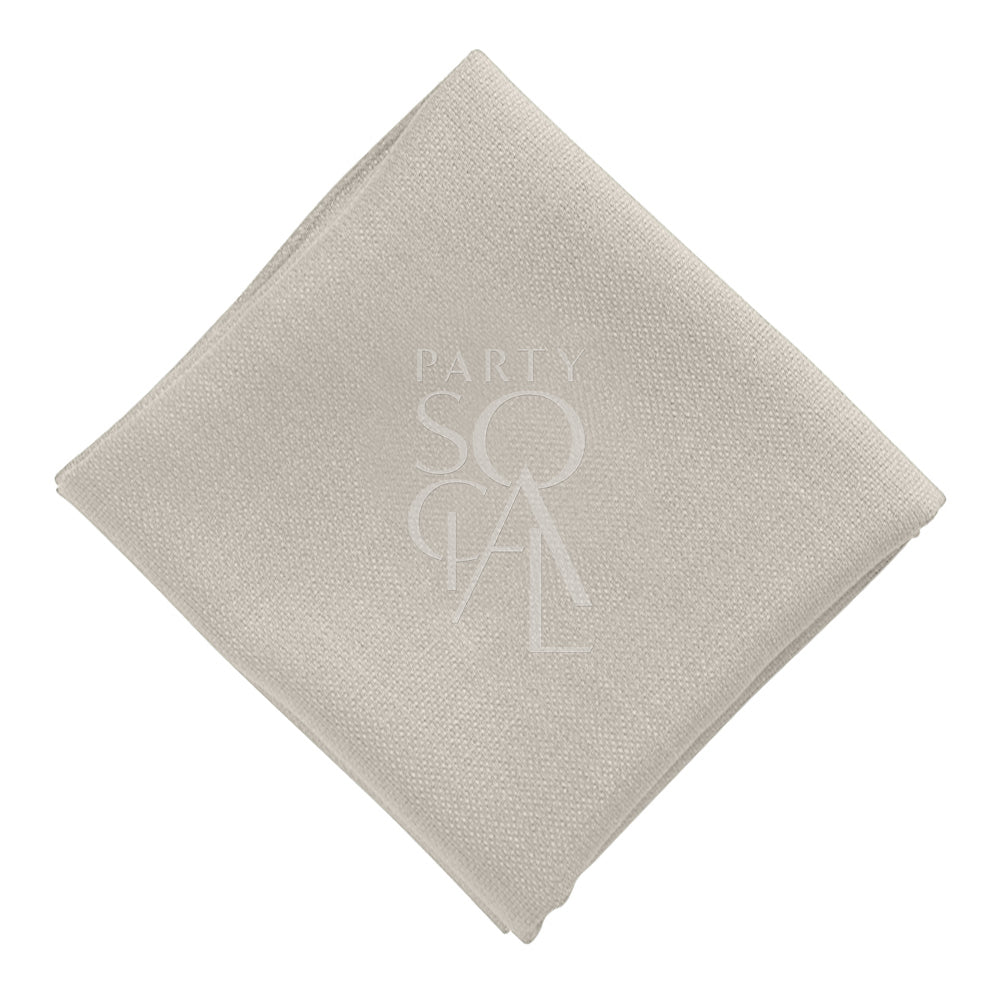 Versatile cotton linen napkin in a light grey color, featuring a soft and smooth texture. The neutral grey shade provides a modern and understated elegance to any table arrangement.