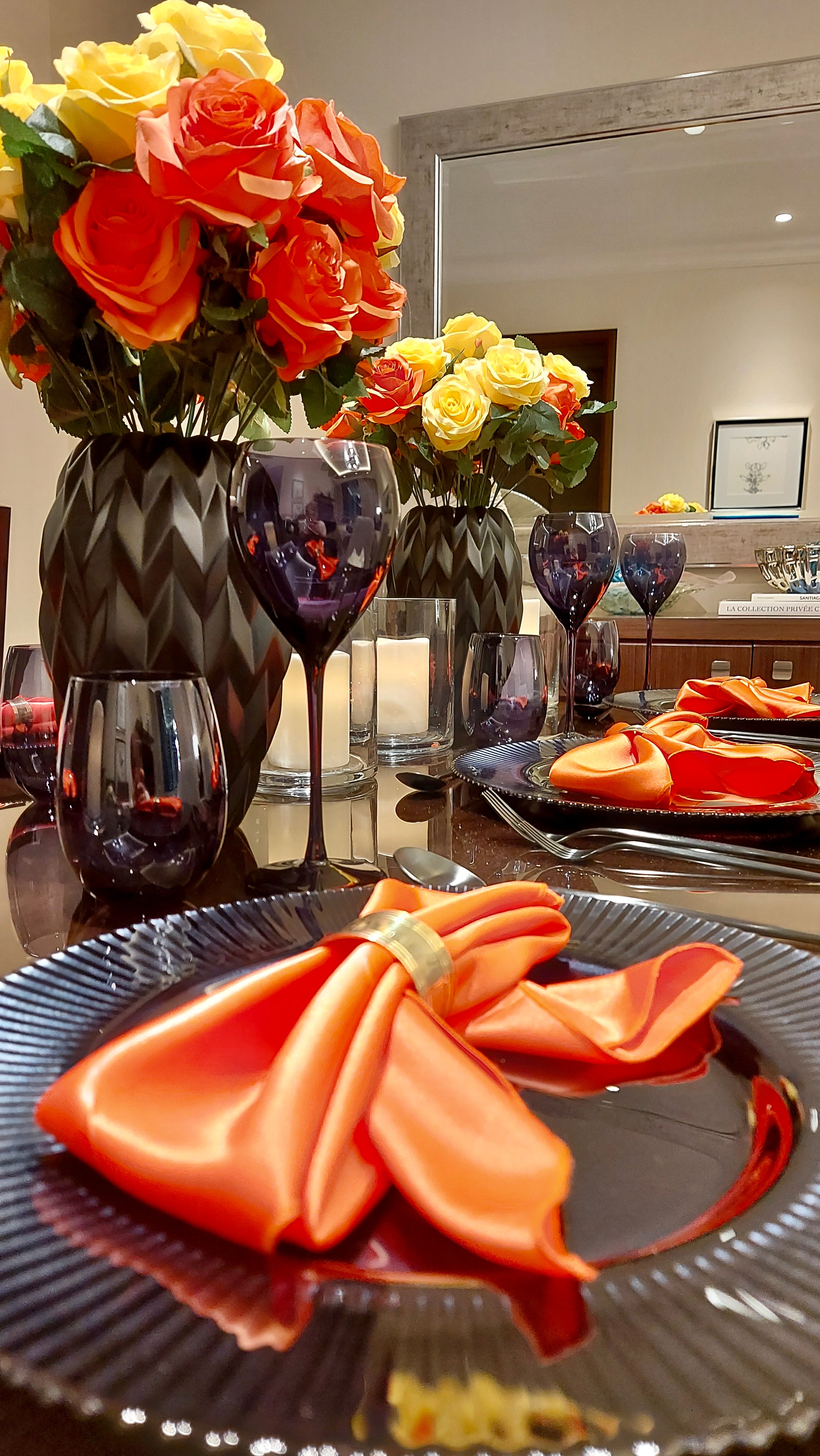 Vibrant orange satin napkin, featuring a bold and lively hue with a smooth, glossy finish. The orange satin adds a playful and energetic touch, perfect for a festive and cheerful table setting.