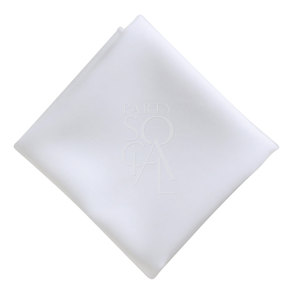 Classic cotton linen napkin in a crisp white color, showcasing a smooth and clean texture. The timeless white shade adds a fresh and elegant touch to any dining arrangement.