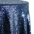 Round sequin tablecloth in deep navy, featuring a luxurious, shimmering surface. The navy sequins add a touch of elegance and sophistication, perfect for creating a dramatic and refined table setting.