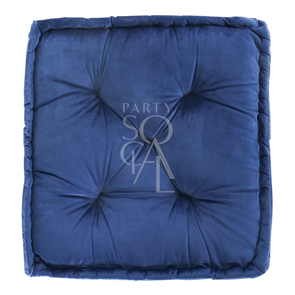 Luxurious floor cushion in deep navy velvet, featuring a rich, plush texture. The dark blue hue adds a sophisticated and elegant touch, making it a stylish addition to any living space or seating area.