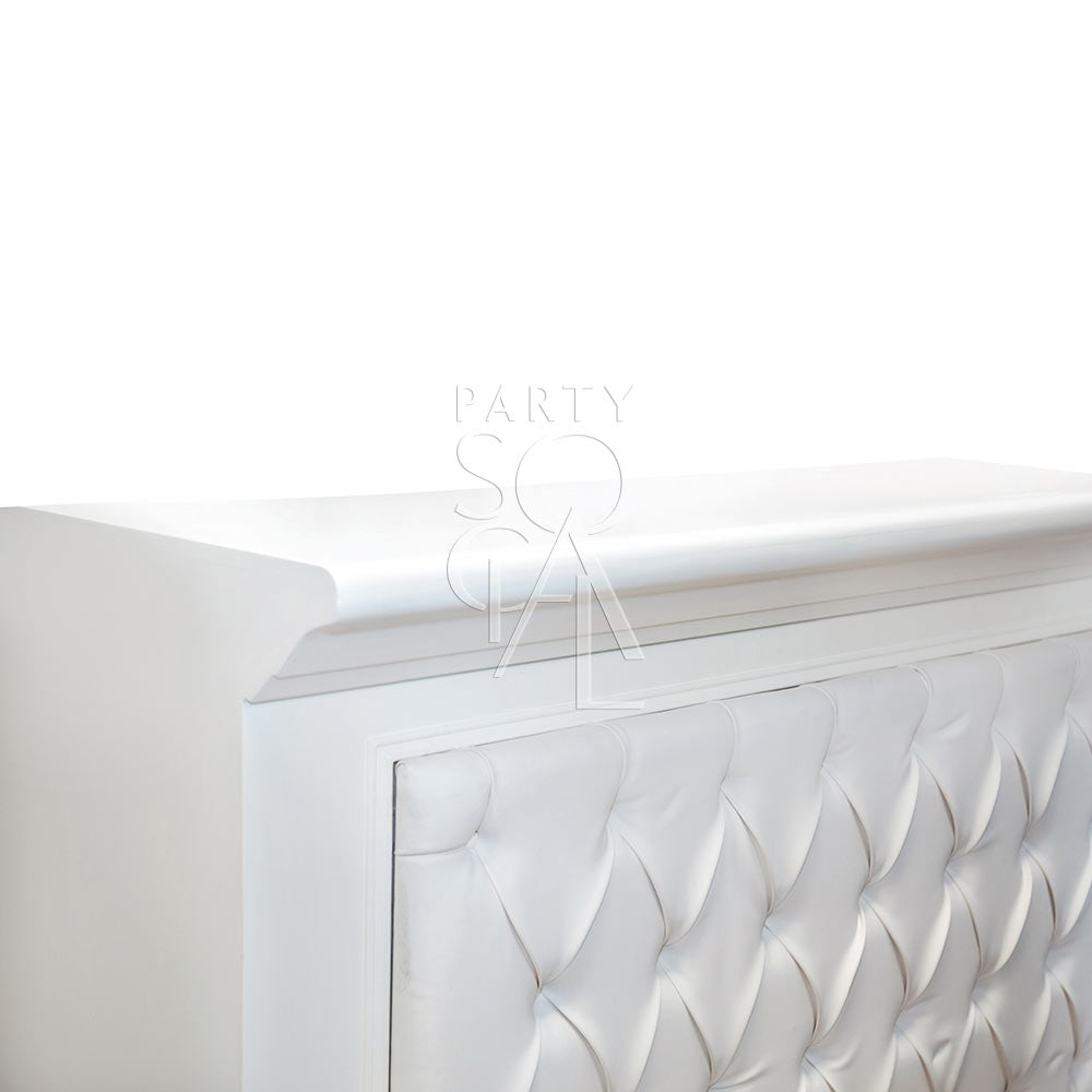 Chic white leather bar unit with a sleek, modern design, featuring a smooth leather finish and ample storage space, perfect for creating a sophisticated and stylish bar area.