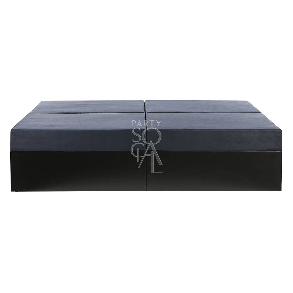 Modern dark grey sofa island with a sleek design, offering a spacious and comfortable seating option, perfect for contemporary living spaces or outdoor lounges.