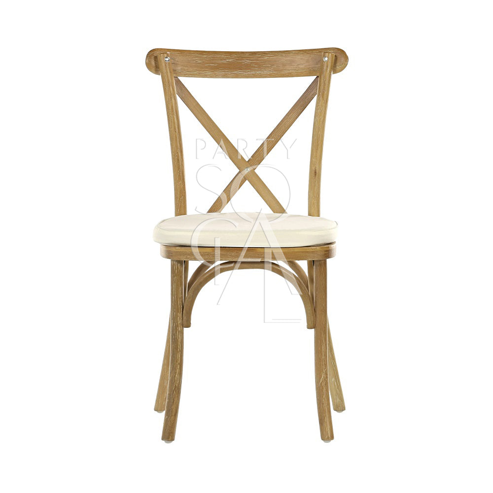 Crossback chair crafted from oak wood, showcasing a traditional design with a distinctive crisscross backrest and sturdy, natural wood construction. Ideal for rustic or farmhouse-style settings.