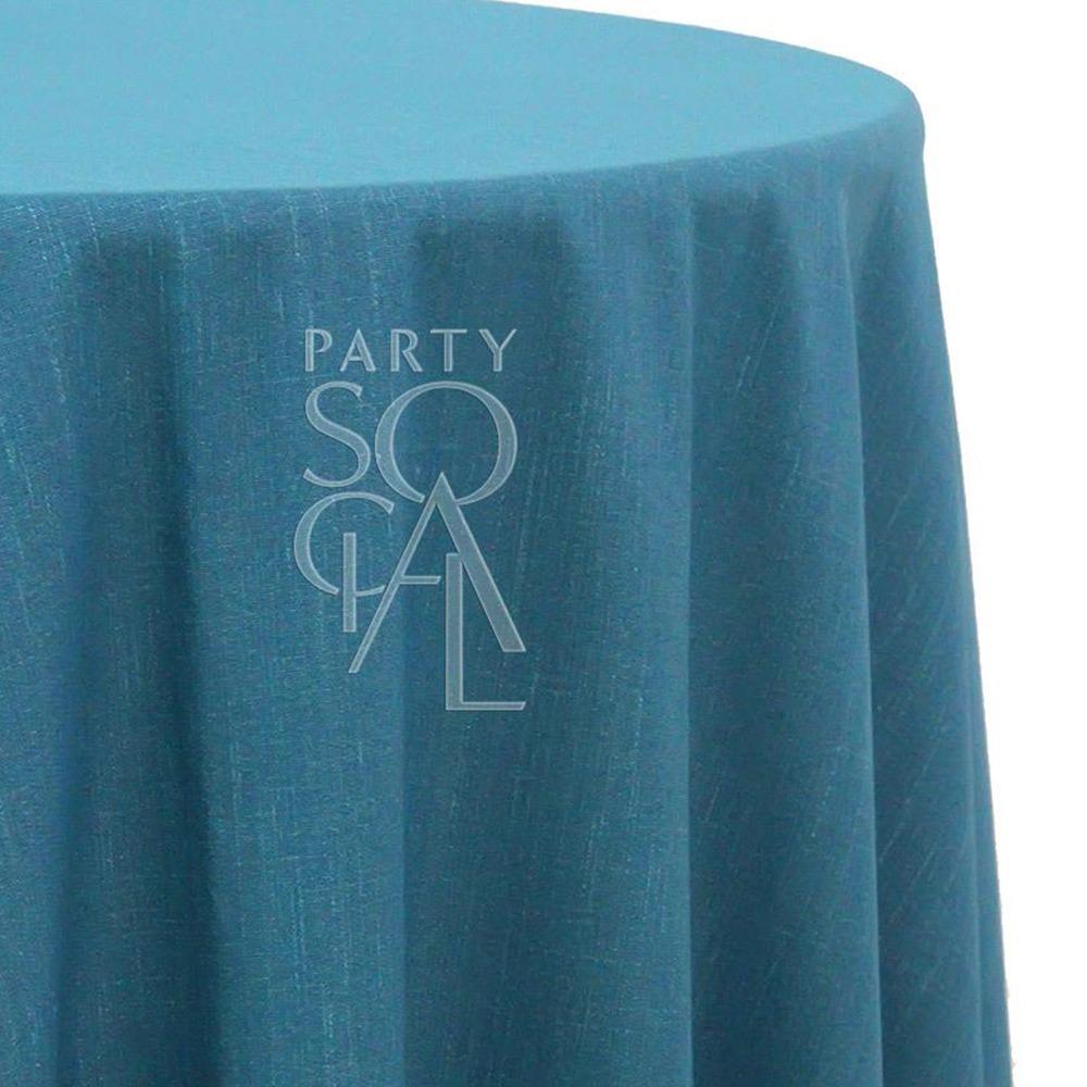 Round linen blend tablecloth in peacock, showcasing a rich and vibrant shade of blue-green. The peacock color adds a bold and luxurious touch, perfect for making a statement at any event.