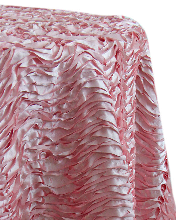 Round tablecloth with a textured fabric, featuring a subtle and elegant pattern that adds depth and interest. The textured design enhances the table setting with a sophisticated and stylish touch, ideal for both casual and formal occasions.