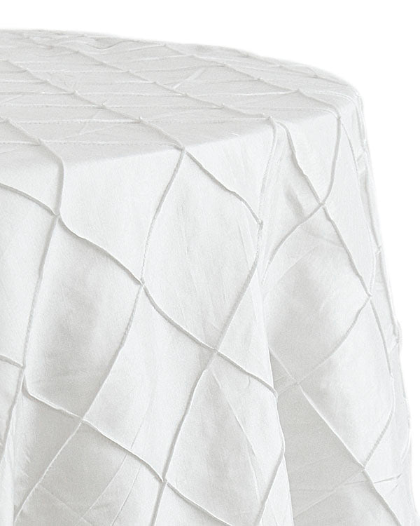 Round tablecloth with a textured fabric, featuring a subtle and elegant pattern that adds depth and interest. The textured design enhances the table setting with a sophisticated and stylish touch, ideal for both casual and formal occasions.