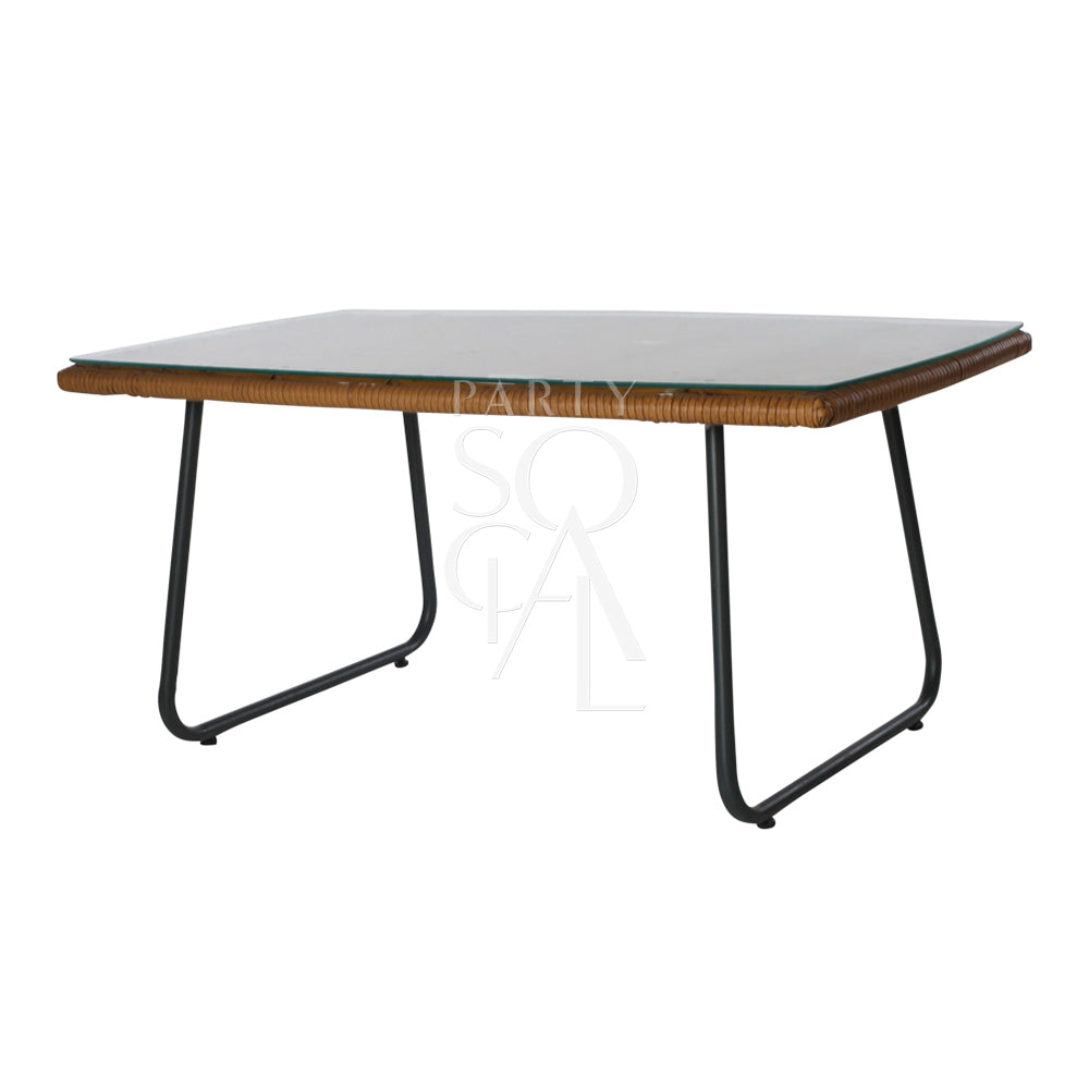 Charming rattan coffee table featuring a natural woven rattan base with a sleek, transparent glass top. The table’s elegant design combines the texture of rattan with the sophistication of glass, making it a stylish and functional centerpiece for living rooms or outdoor spaces.