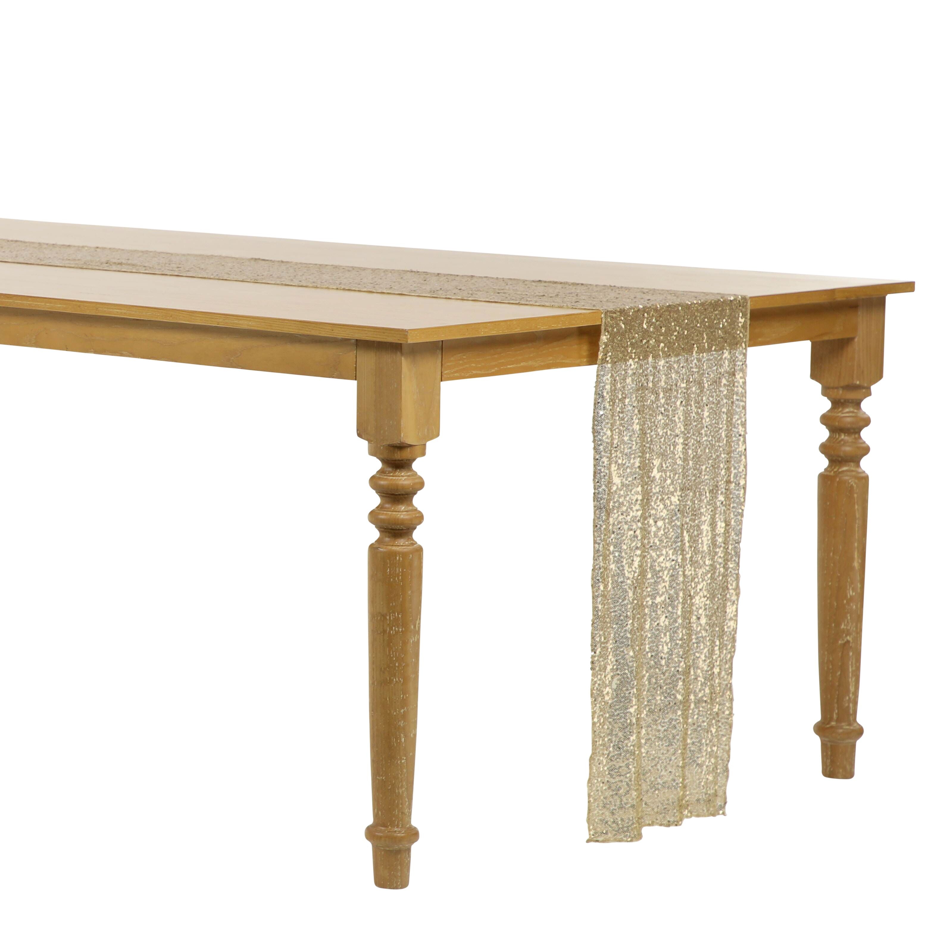 Elegant sequin table runner in a rich gold champagne hue, with a dazzling, reflective finish. The gold champagne sequins provide a luxurious and sophisticated touch, making it an ideal choice for adding opulence and style to any table setting or celebration.