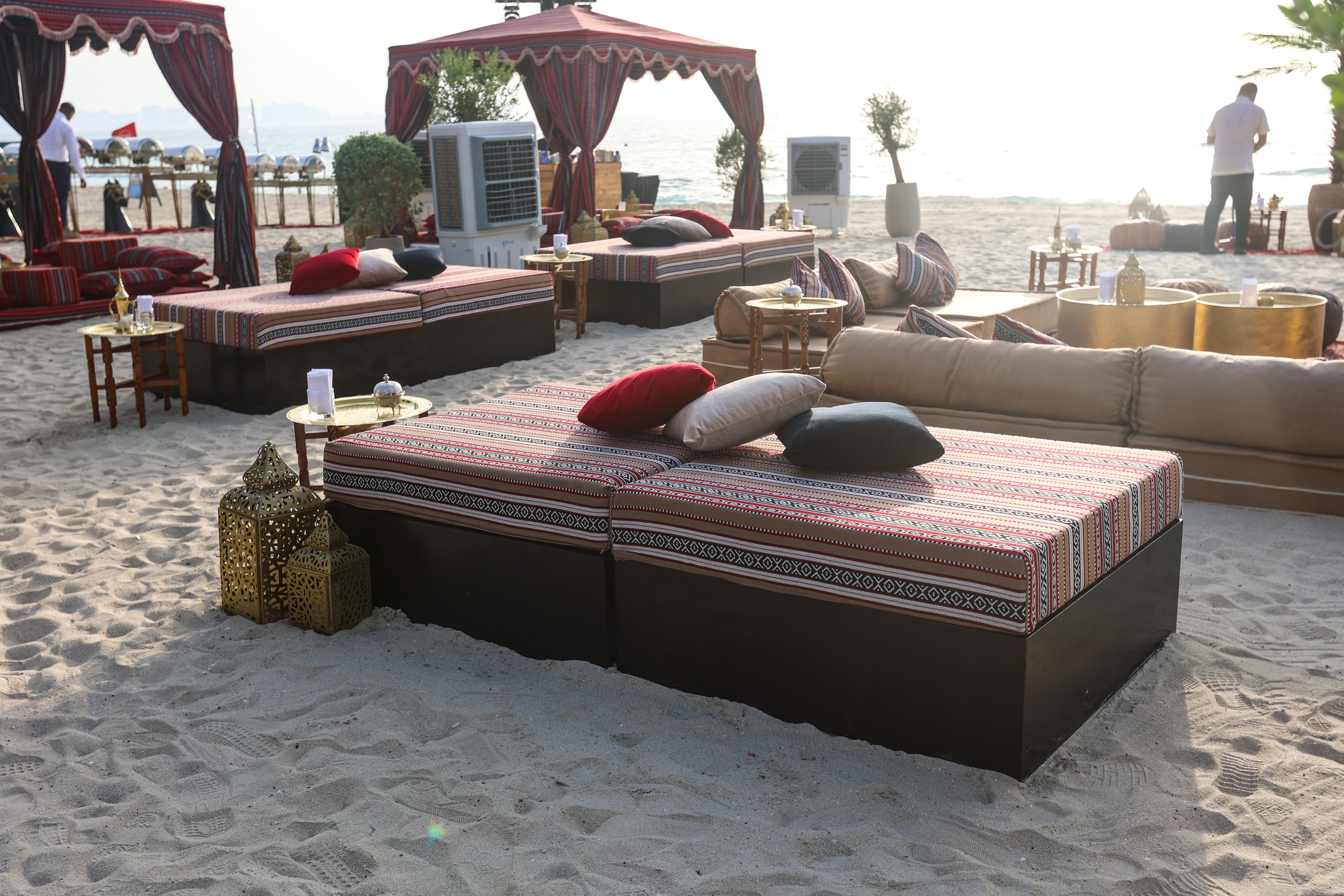 Elegant Arabic-style sofa island featuring intricate patterns and vibrant colors, providing a luxurious and culturally inspired seating arrangement, ideal for creating a warm and inviting atmosphere.