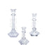 Elegant set of three tapered glass candle holders. Each holder features a sleek, slender design with a tapering silhouette, ideal for adding a touch of sophistication to any table setting. The clear glass enhances the ambiance by reflecting candlelight beautifully.
