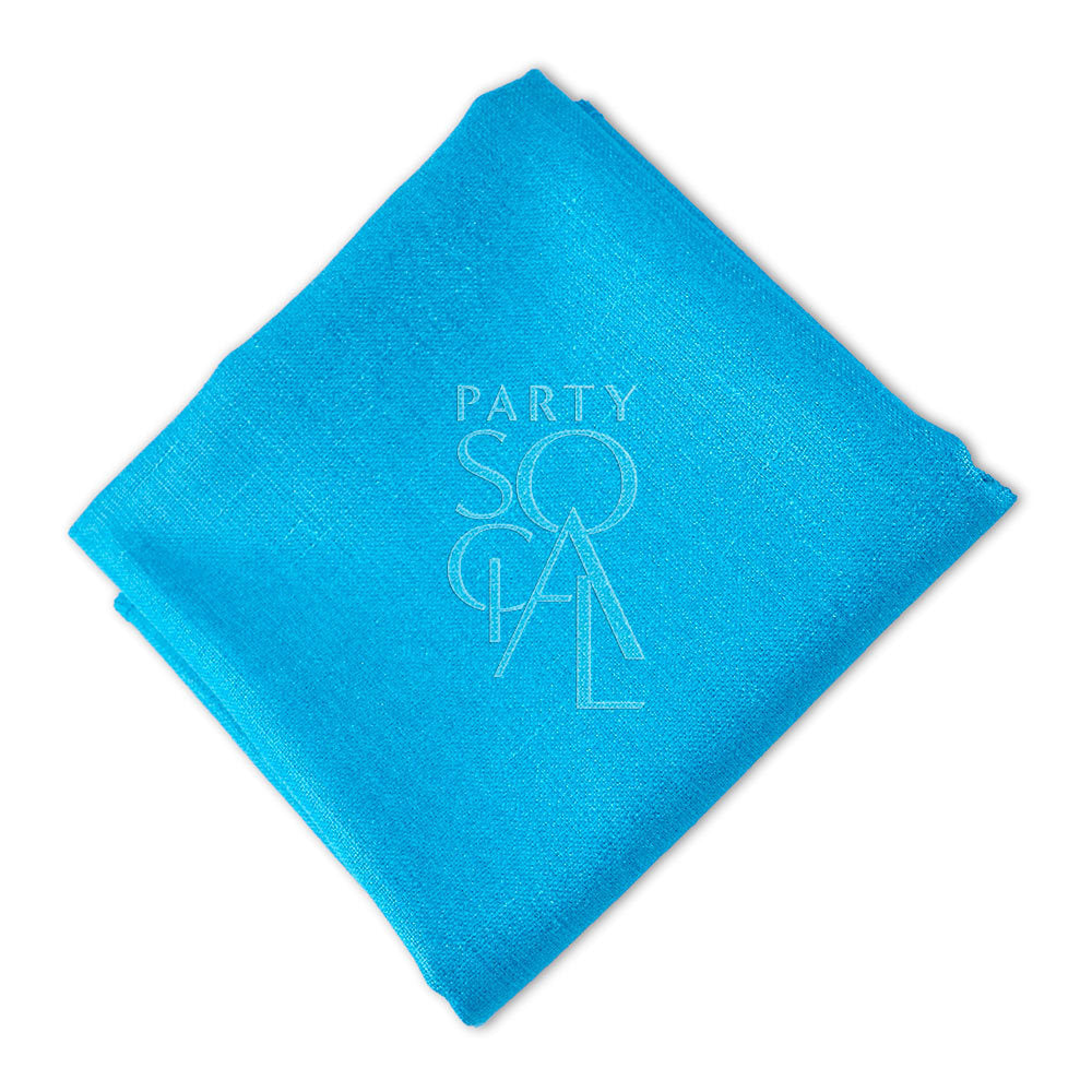 Vibrant turquoise linen blend napkin, featuring a bright and lively color that brings a fresh and stylish look to your table.