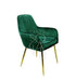 Luxurious chair upholstered in rich royal green velvet, featuring a sleek and contemporary design. The chair&