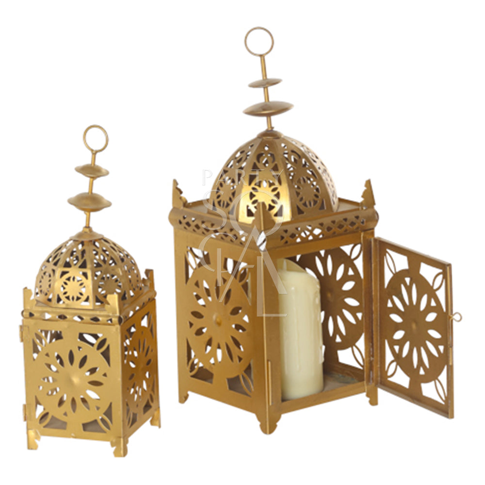 An intricately designed vintage Arabic lantern with a rich gold finish. The lantern features ornate geometric patterns and detailed metalwork, creating a warm, ambient glow when lit. Its classic design includes a hinged door for easy access to the candle or light source inside.