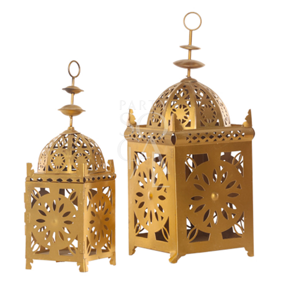 An intricately designed vintage Arabic lantern with a rich gold finish. The lantern features ornate geometric patterns and detailed metalwork, creating a warm, ambient glow when lit. Its classic design includes a hinged door for easy access to the candle or light source inside.