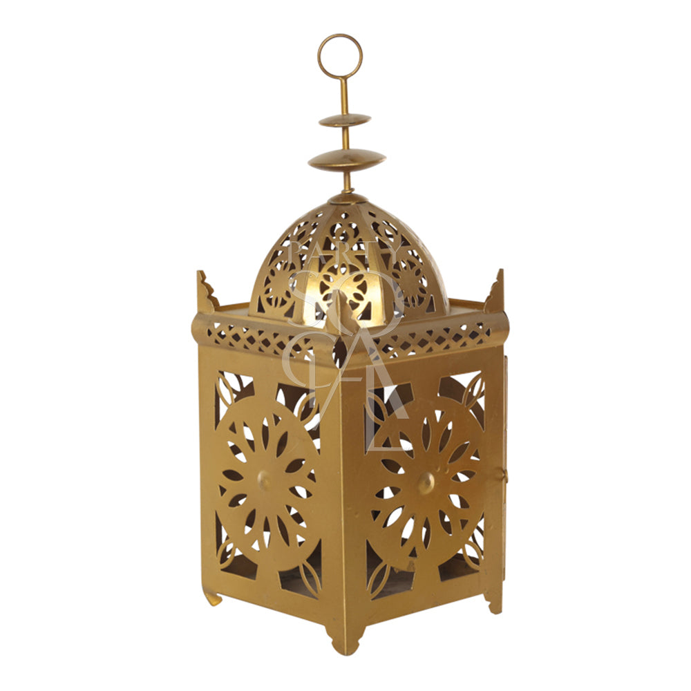 An intricately designed vintage Arabic lantern with a rich gold finish. The lantern features ornate geometric patterns and detailed metalwork, creating a warm, ambient glow when lit. Its classic design includes a hinged door for easy access to the candle or light source inside.