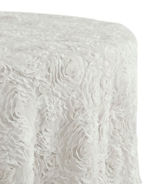 Round tablecloth with a textured fabric, featuring a subtle and elegant pattern that adds depth and interest. The textured design enhances the table setting with a sophisticated and stylish touch, ideal for both casual and formal occasions.