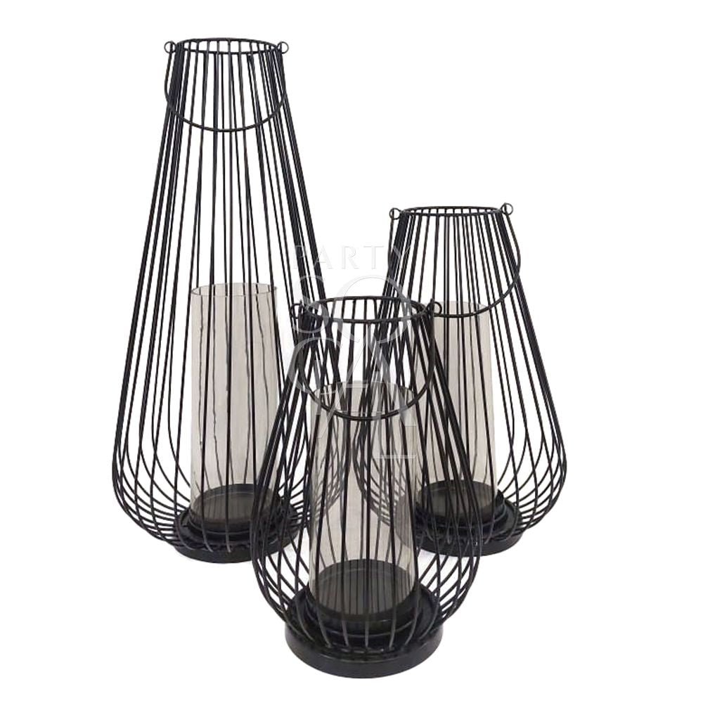 Stylish black wire lanterns with a geometric design, featuring a sleek, open-frame construction that casts intricate shadows when illuminated. The black metal wire adds a contemporary touch, making these lanterns a chic and versatile addition to any indoor or outdoor space.