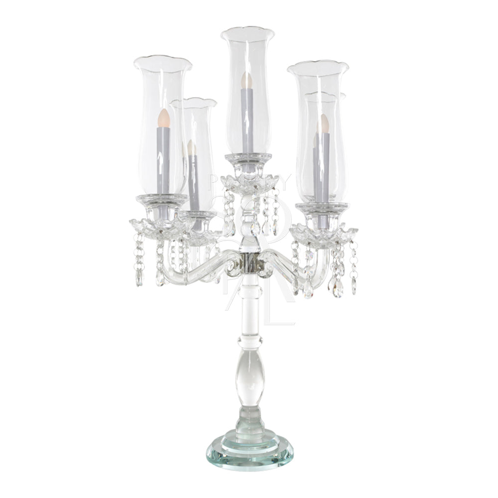 Elegant crystal glass candelabra, featuring multiple arms and intricate cut details that create a stunning sparkle. The candelabra’s clear crystal design adds a touch of sophistication and glamour, making it a perfect centerpiece for any formal or romantic setting.