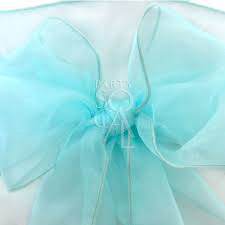 Stylish organza chair sash in Tiffany Blue, featuring a sheer, glossy fabric with a vibrant, refreshing color. The Tiffany Blue adds a distinctive and charming accent, perfect for making a statement at any event.