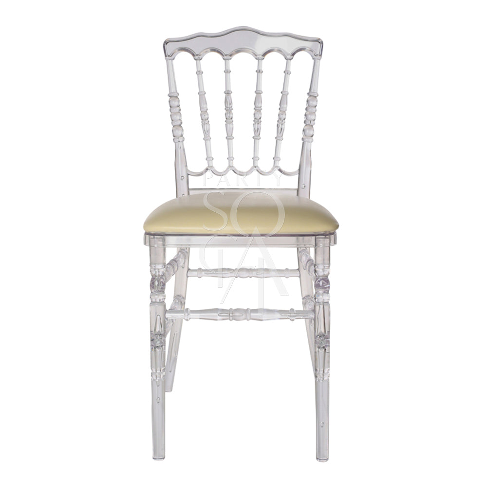 Elegant Napoleon acrylic chair with a transparent design, featuring a classic silhouette and ornate detailing. The chair’s clear acrylic construction offers a modern twist on traditional styling, providing a sophisticated and airy look that complements a variety of decor settings.