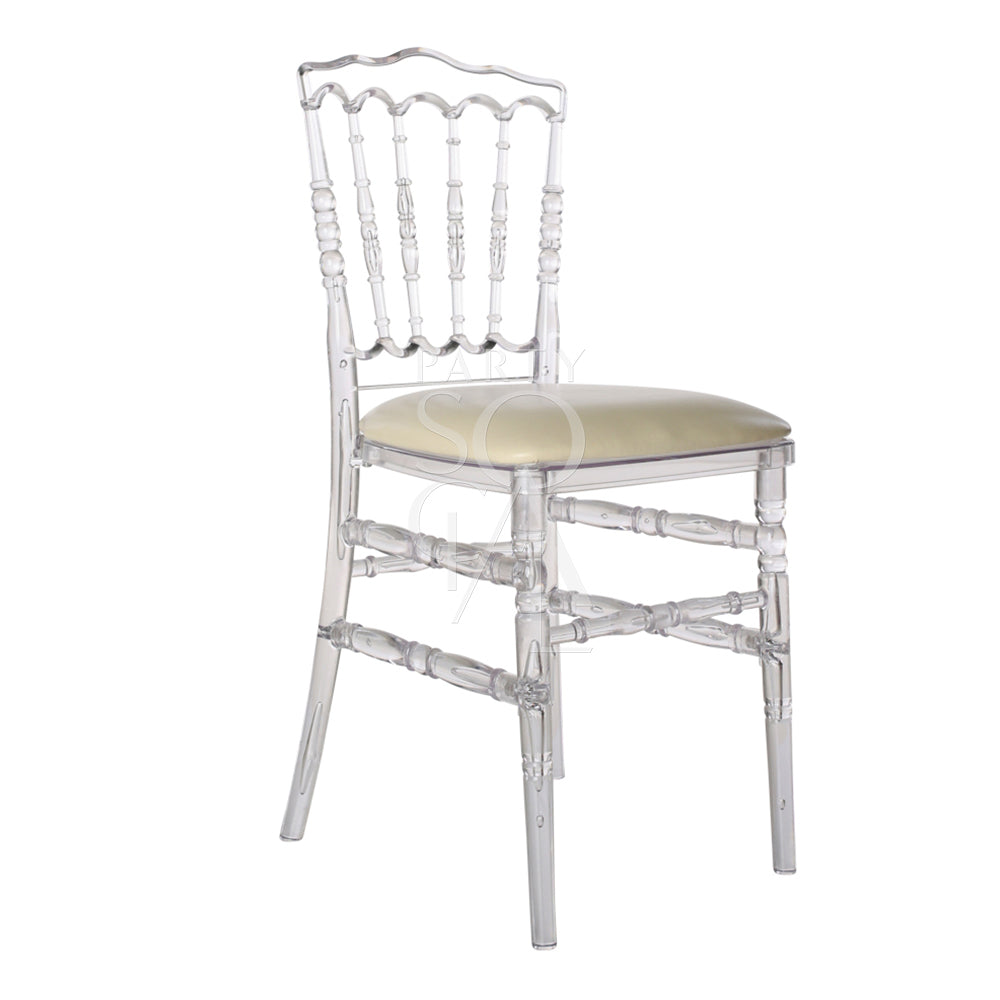 Elegant Napoleon acrylic chair with a transparent design, featuring a classic silhouette and ornate detailing. The chair’s clear acrylic construction offers a modern twist on traditional styling, providing a sophisticated and airy look that complements a variety of decor settings.
