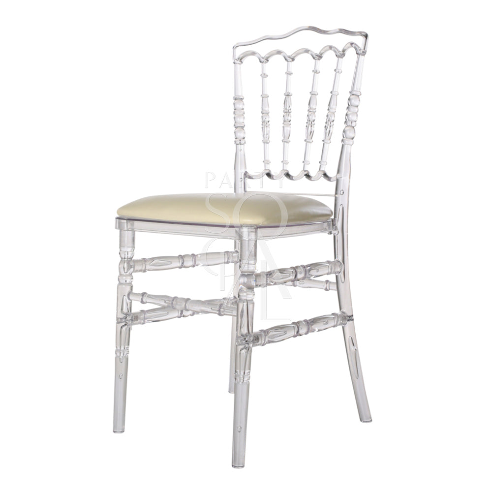 Elegant Napoleon acrylic chair with a transparent design, featuring a classic silhouette and ornate detailing. The chair’s clear acrylic construction offers a modern twist on traditional styling, providing a sophisticated and airy look that complements a variety of decor settings.