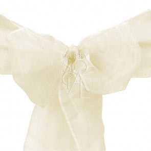 Refined organza chair sash in ivory, featuring a soft, sheer fabric with a gentle, light finish. The ivory color provides a classic and timeless touch, perfect for creating an elegant and cohesive look for any occasion.