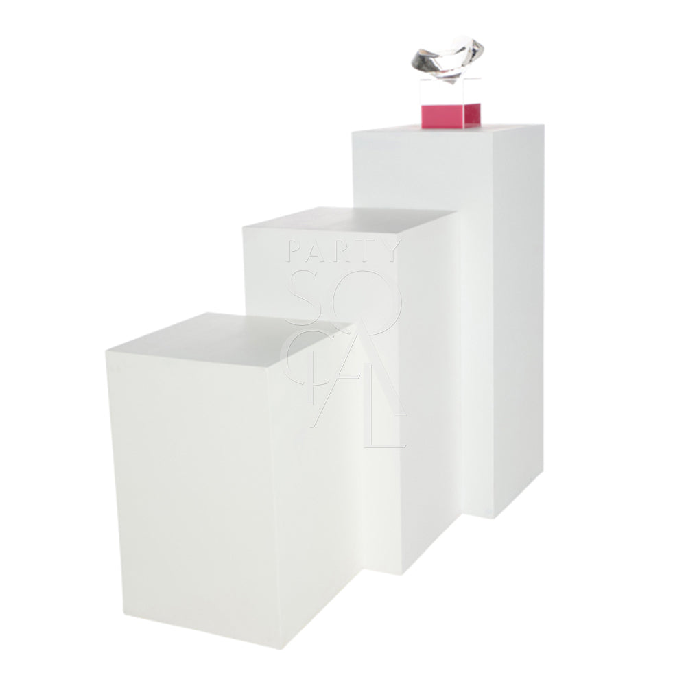Modern square white podiums with a sleek, minimalist design and smooth finish. The podiums provide a clean and elegant platform, ideal for displaying awards, decor, or event features. Their crisp white color and simple shape add a touch of sophistication to any presentation or setting.