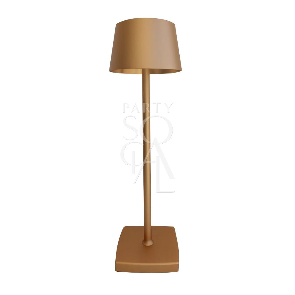 Chic wireless lamp in rose gold, showcasing a stylish design with a gleaming, metallic finish. The rose gold color adds a touch of luxury and elegance, while the wireless feature offers convenience and flexibility, making it a perfect accent piece for any decor.