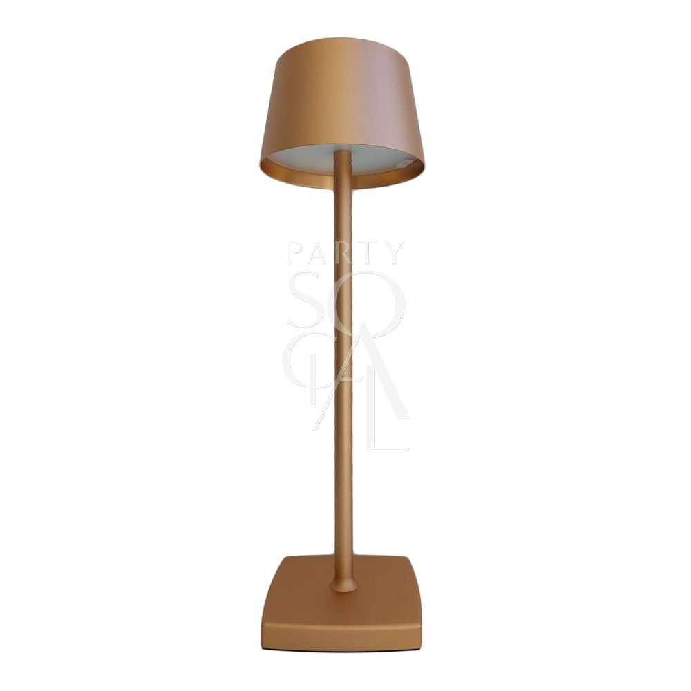 Chic wireless lamp in rose gold, showcasing a stylish design with a gleaming, metallic finish. The rose gold color adds a touch of luxury and elegance, while the wireless feature offers convenience and flexibility, making it a perfect accent piece for any decor.