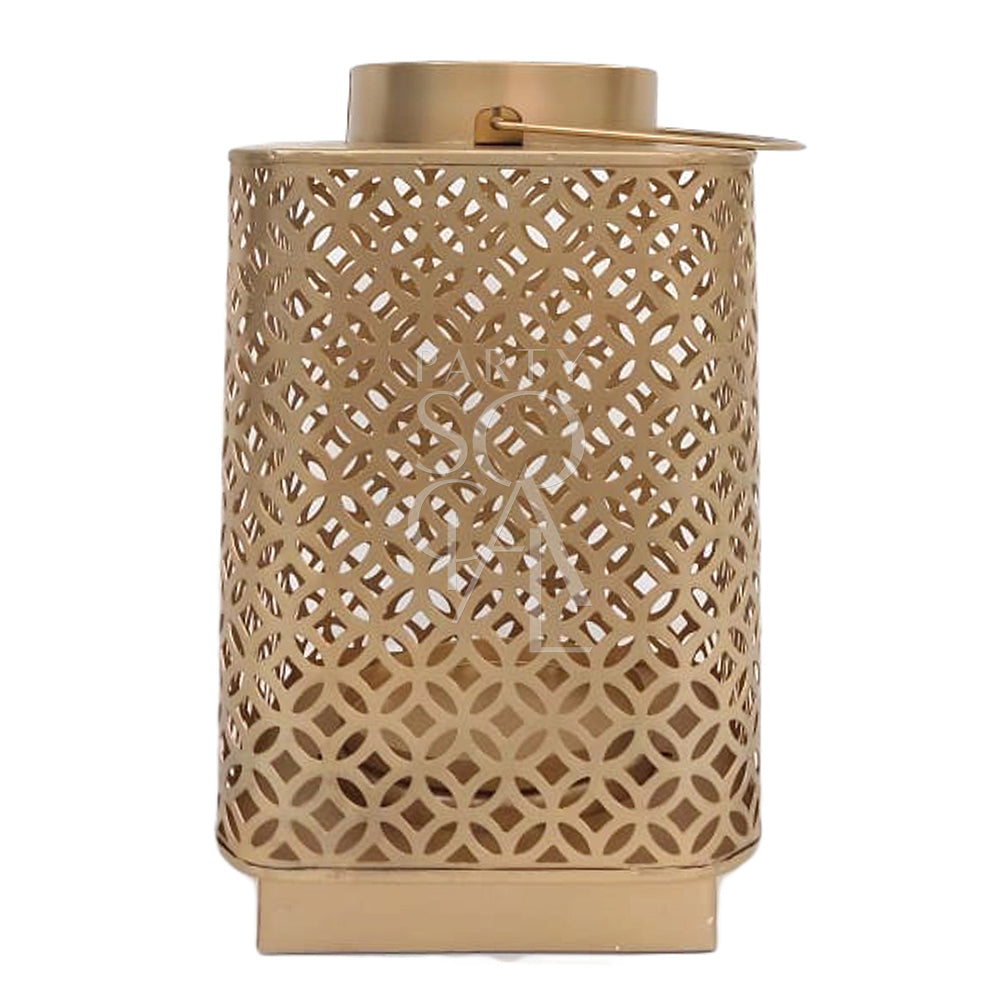 Stylish gold square lantern with a sleek, modern design. Made from metal with a rich gold finish, this lantern features clear glass panels on each side, allowing light to shine through and create a warm, inviting glow. Ideal for adding a touch of elegance to any space.