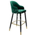 A stylish velvet stool in royal green. This elegant stool features a plush velvet upholstery in a rich, vibrant green color, adding a touch of luxury and sophistication. Ideal for use as extra seating or as a decorative accent, its deep green hue enhances any space with a pop of color and class.