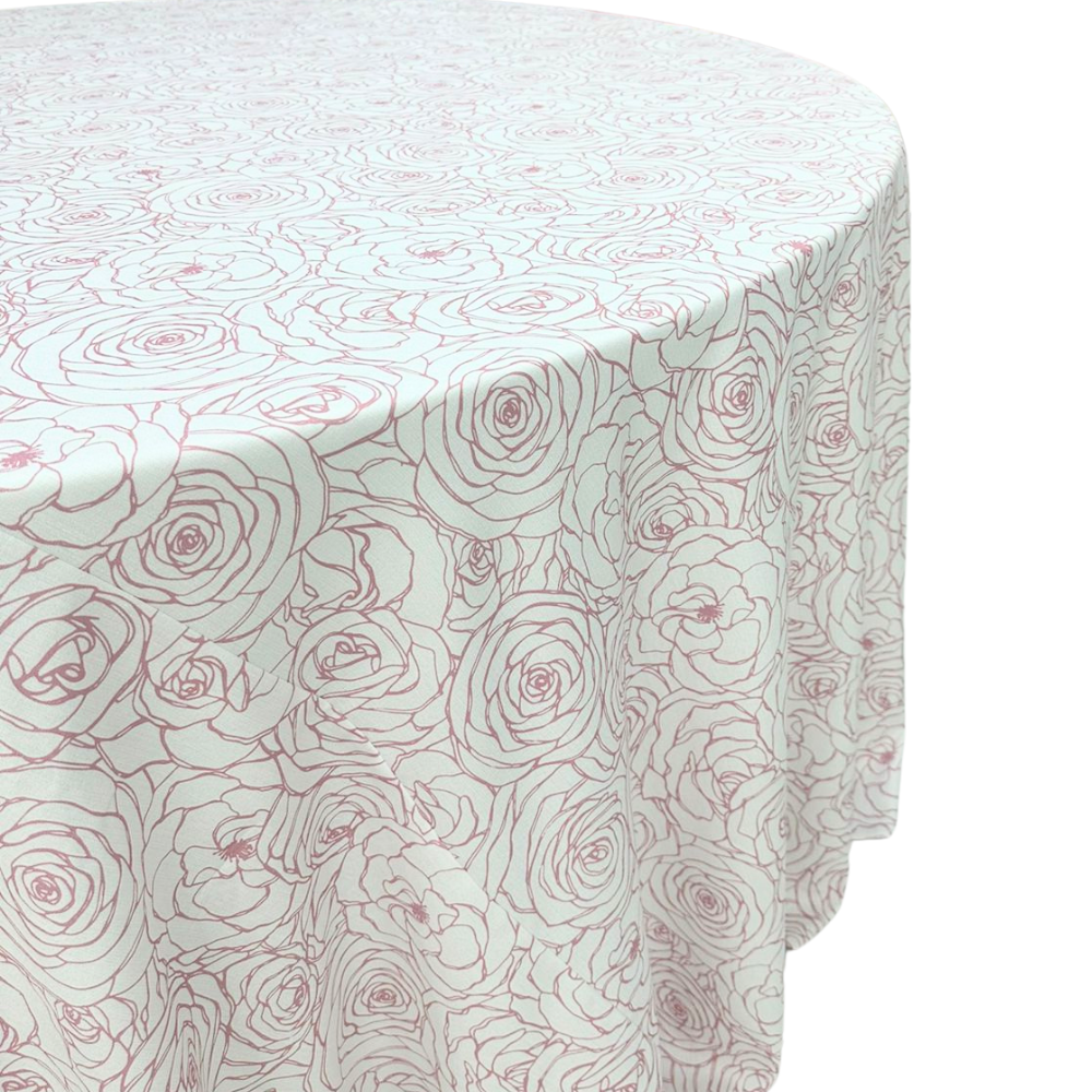 A round tablecloth in pink featuring a charming floral pattern. This elegant tablecloth adds a touch of sophistication and warmth to your dining setting, ideal for both casual meals and special occasions. The soft pink color and floral design create a delightful and inviting atmosphere.