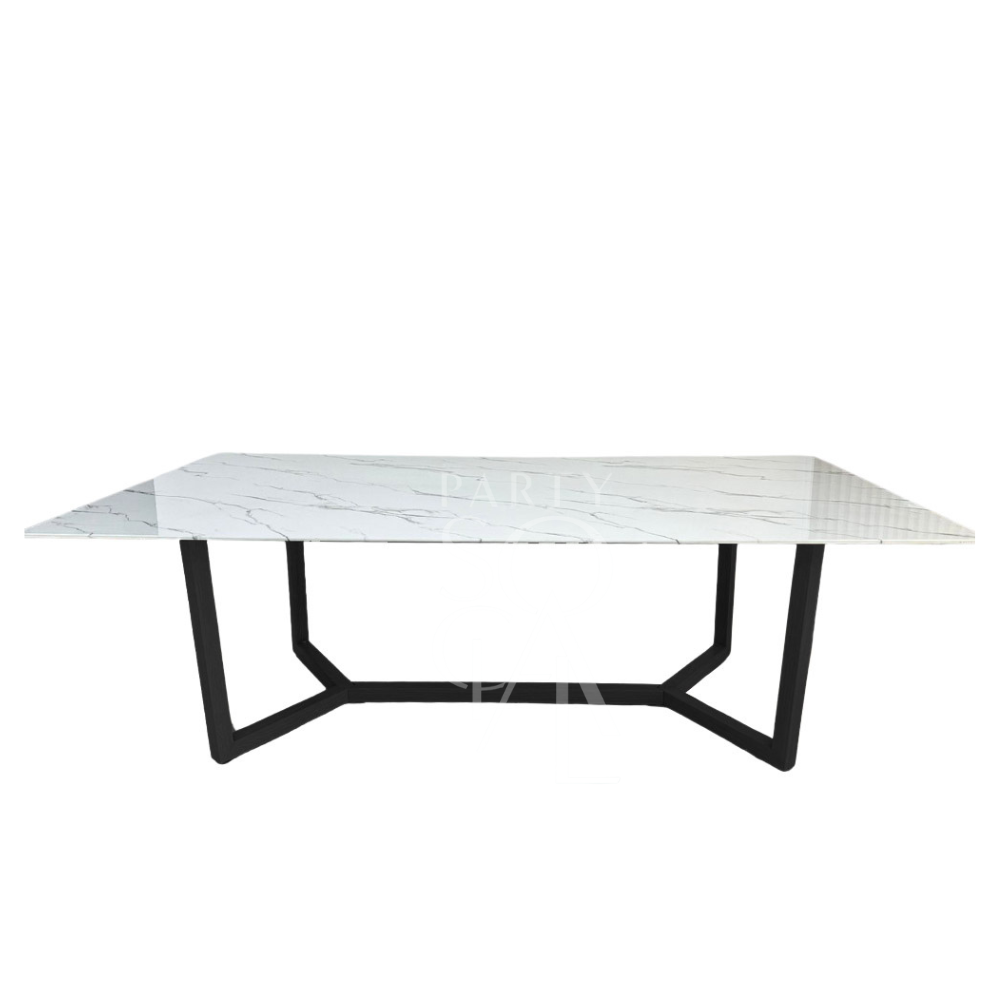 A table with a black base and a white marble top, featuring a chic and modern design. The black base offers a bold contrast to the crisp white marble top, creating a striking and sophisticated look. This table adds a touch of elegance and contemporary style to any space.