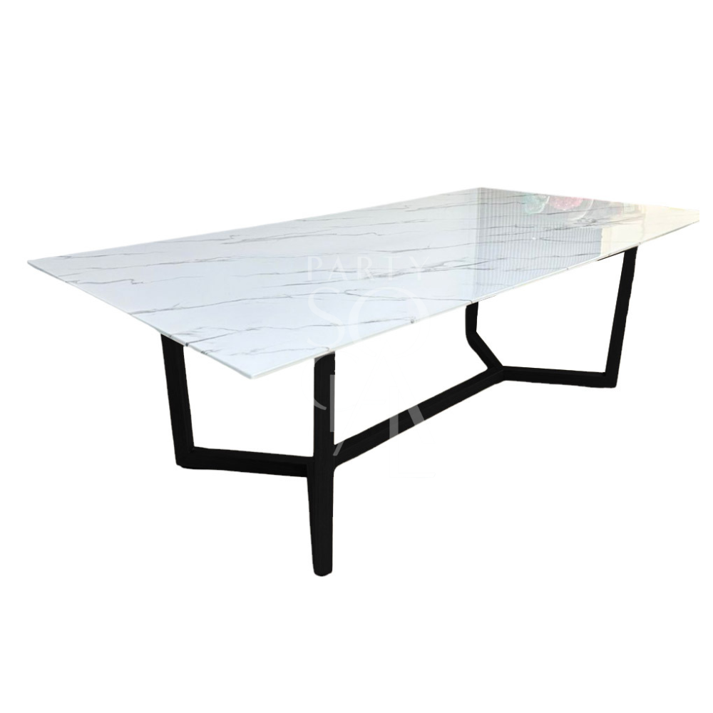 A table with a black base and a white marble top, featuring a chic and modern design. The black base offers a bold contrast to the crisp white marble top, creating a striking and sophisticated look. This table adds a touch of elegance and contemporary style to any space.